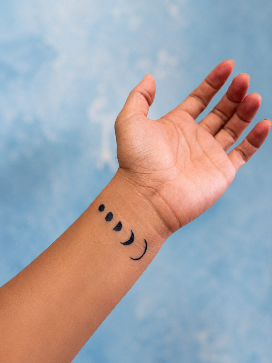 Phases of Mercury temporary tattoo on skin